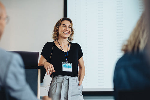 Businesswoman delivering a speech in a conference