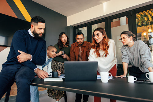 Group of businesspeople having a discussion in a boardroom