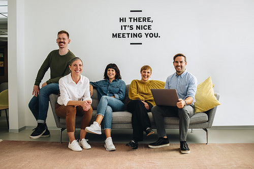 Successful business team sitting at lobby