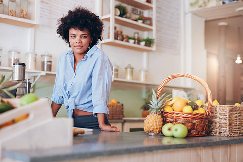Confident woman juice bar owner