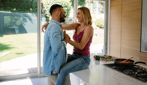 Romantic couple in their kitchen