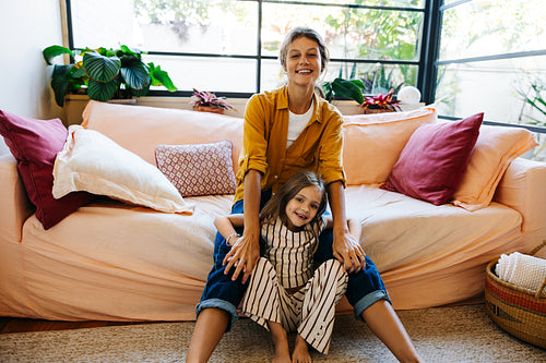 Family moment: mother and daughter share joyful hug