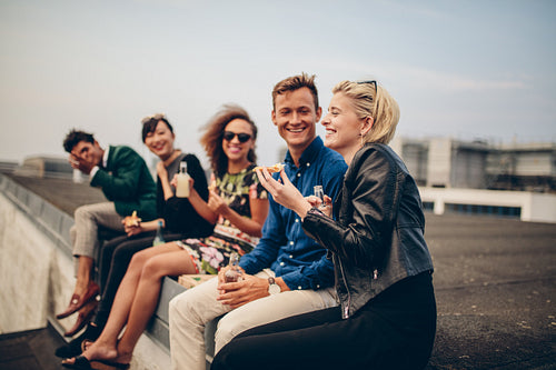 Young people partying on terrace