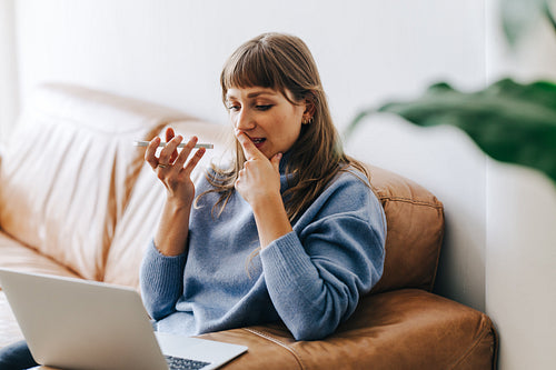 Thoughtful businesswoman having a phone call in an office