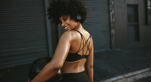 Sportswoman relaxing after workout