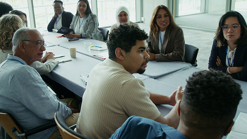 Attendees engaging in group discussion