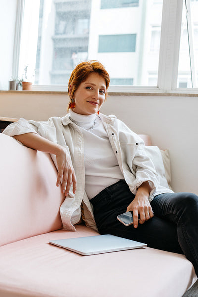 Creative professional relaxing in a modern co-working space