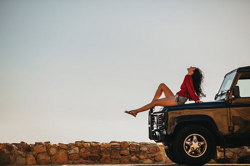Woman taking a break on the road trip