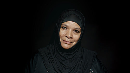Cheerful Islamic woman in hijab