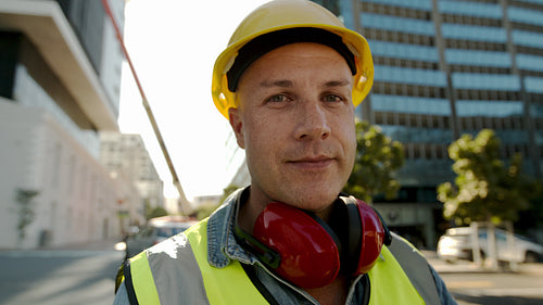 Male worker standing at construction site