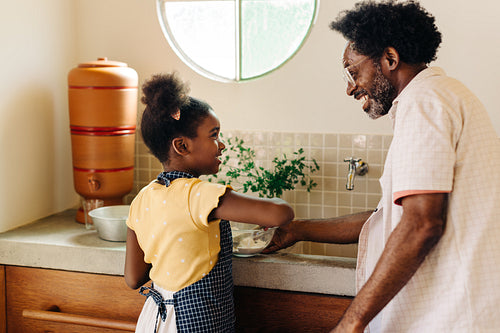 Dad and daughter baking: Brazilian family making memories in the kitchen