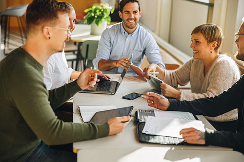 Executives in a meeting discussing on creative ideas