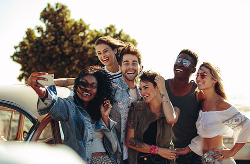 Posing for a road trip selfie