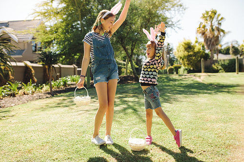 Kids playing in a garden on a sunny day