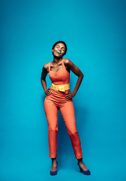 African woman in stylish outfit