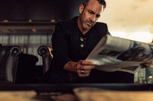 Businessman waiting in hotel foyer