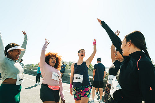 Ladies celebrating at a community running event