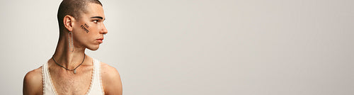 Transgender male on white background