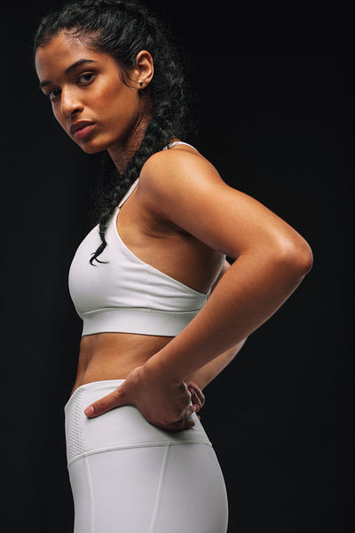 Monochrome fitness portrait of female athlete