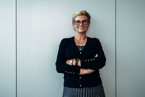 Confident senior businesswoman with her arms crossed