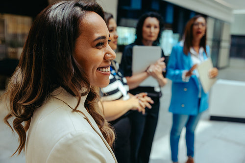 Confident colleagues in a casual office setting discussion