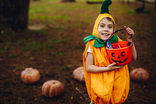 Little girl trick or treating on Halloween