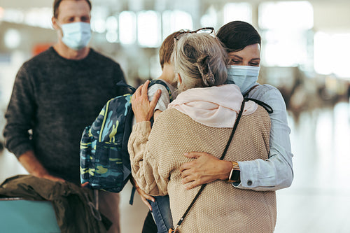 Grandma welcoming family arriving after pandemic at airport