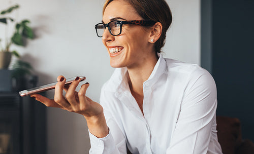 Business woman using mobile phone