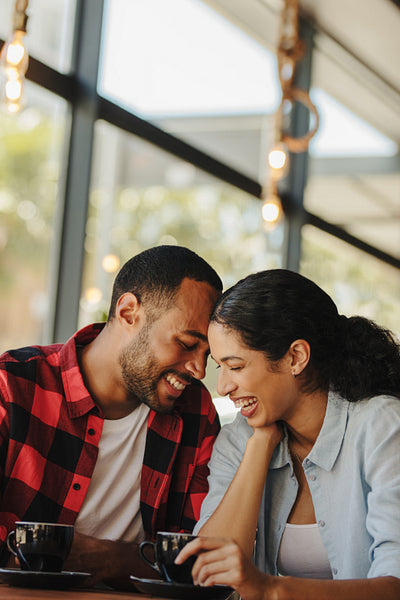 Couple in love having fun in coffee shop