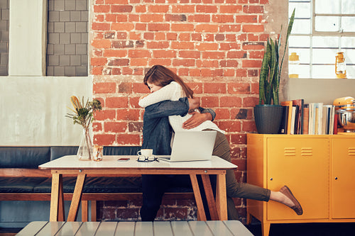 Loving couple meeting in a coffee shop