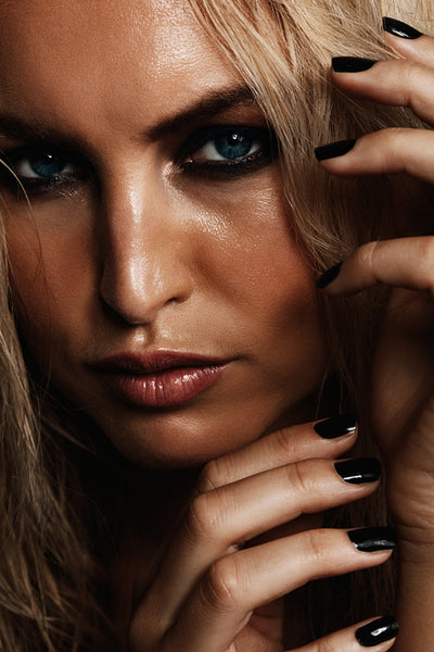 Young woman with wet makeup