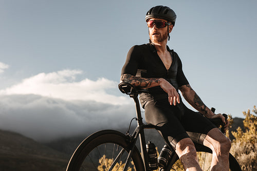 Athlete taking a break from cycling