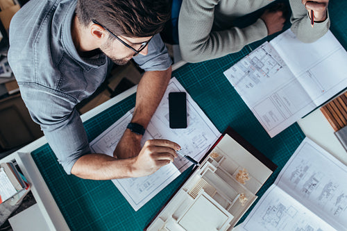Architects working on new architectural house model