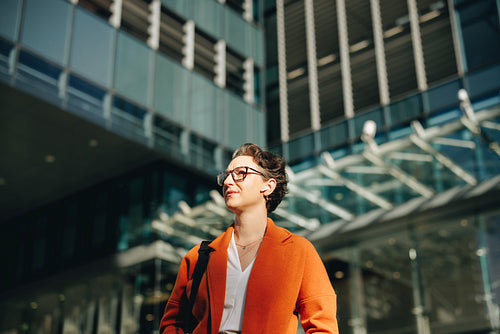 Low angle view of a mature businesswoman commuting to work in the city