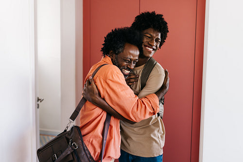 Father and son embrace in their daily morning routine