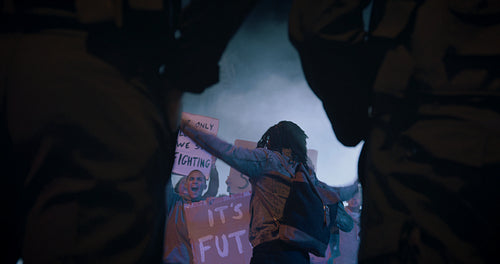 Male activist leading a group of protestors