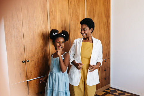 Mother and daughter together: Happy moments of fashion and style in the bedroom