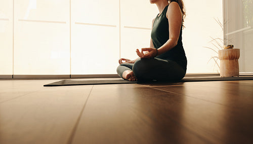 Senior woman practicing hatha yoga