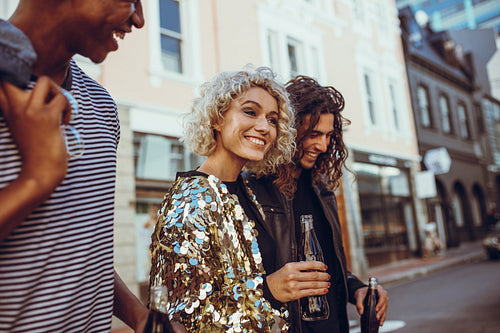 Friends having fun on city street