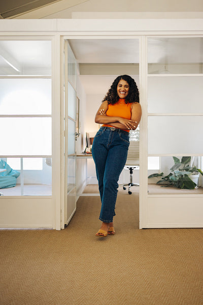 Successful female entrepreneur smiling at the camera
