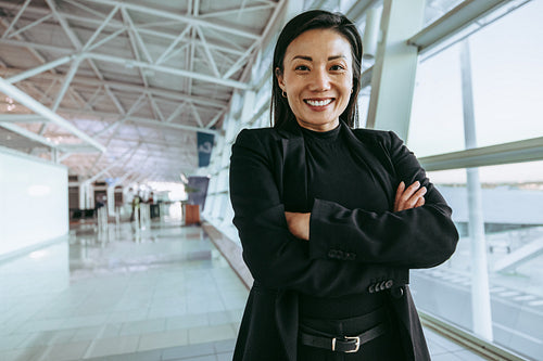 Female traveler waiting at airport terminal