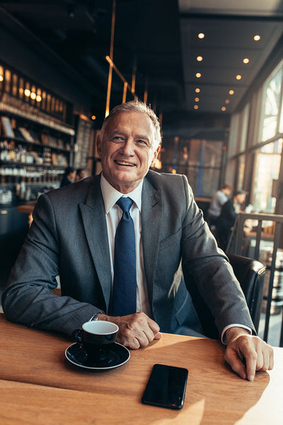 Male entrepreneur relaxing at coffee shop