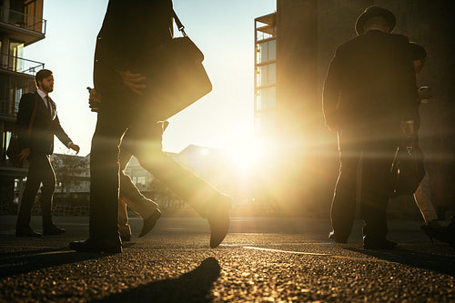 Businessmen commuting to office early in the morning