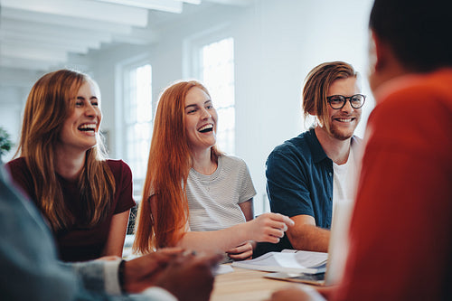 Students smiling during group study in college