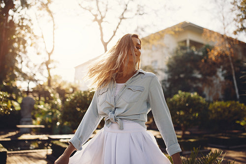 Young woman enjoying outdoors in a garden