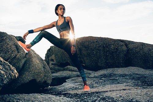 Female relaxing after workout session outdoors