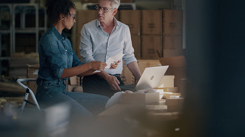 Online store business partners preparing a product for delivery