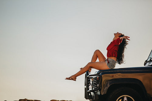 Woman enjoying on road trip vacation