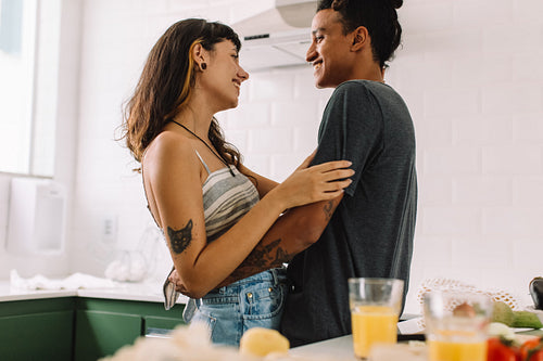 Sweet couple being romantic in the kitchen