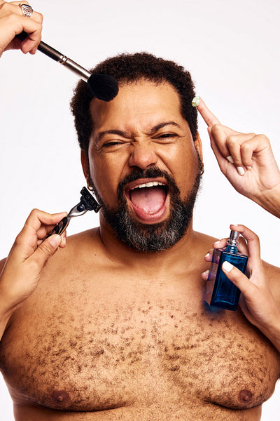 Many hands grooming beard man